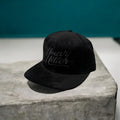 Black on black suede hat